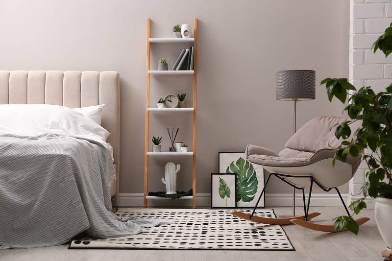 https://blog.society6.com/app/uploads/2023/02/bedroom-rug-placement-reading-nook.jpg