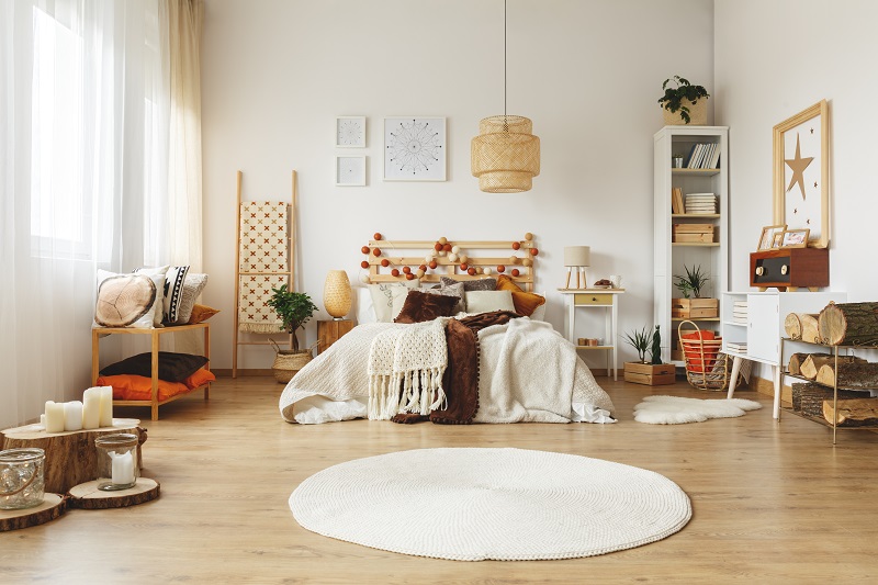 https://blog.society6.com/app/uploads/2023/02/bedroom-small-rug-placement.jpg