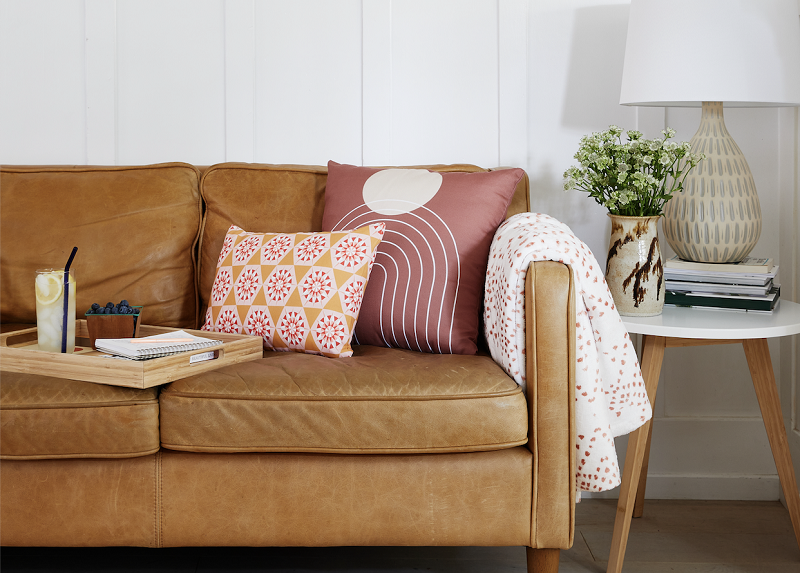 How to dress a sofa outlet with throws and cushions