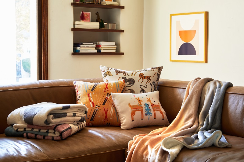 Orange throw blanket outlet and pillows