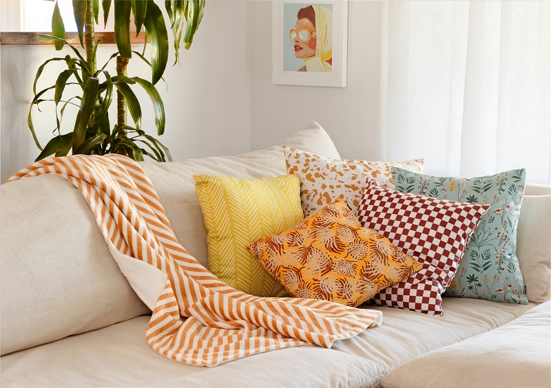 Living room couch with throw pillows